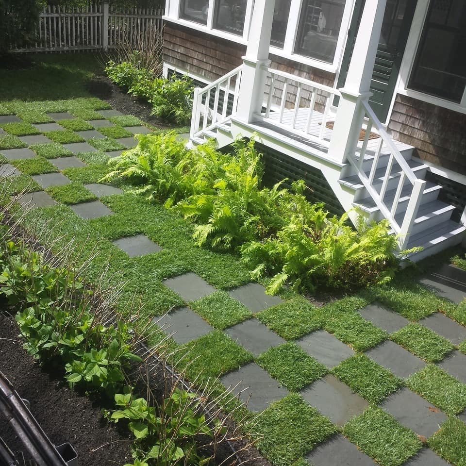 A creative usage of bluestone squares to make a semi-formal patio/sitting area outside this house in Prout's Neck, Scarborough, Maine