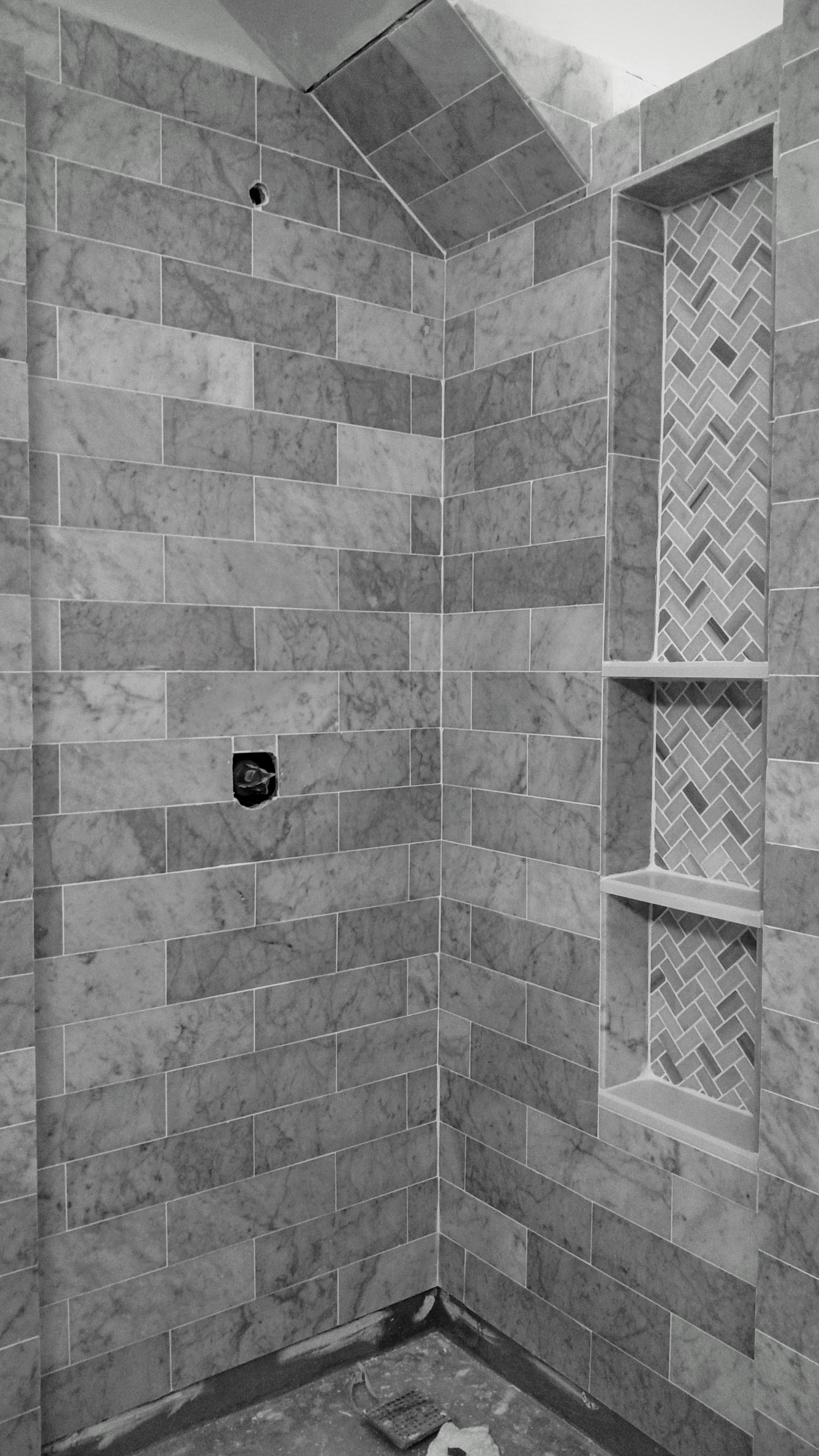 Details are inside a small shower in Falmouth, Maine