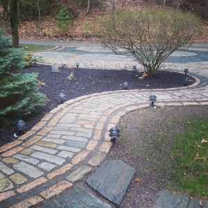 A different perspective on this lakeside cobblestone walkway and driveway in, Windham, Maine